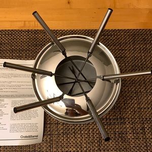 Crate & Barrel stainless steel fondue set.